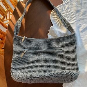 Beautiful brand new without tags gray crocheted the sack bag